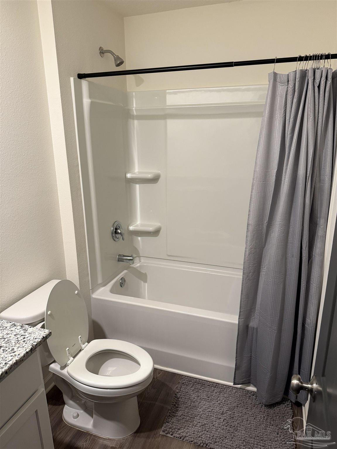 9279 3 Hollow Road Jay, FL 32565 - Photo 36 of 42 a bathroom with a granite countertop sink toilet and shower