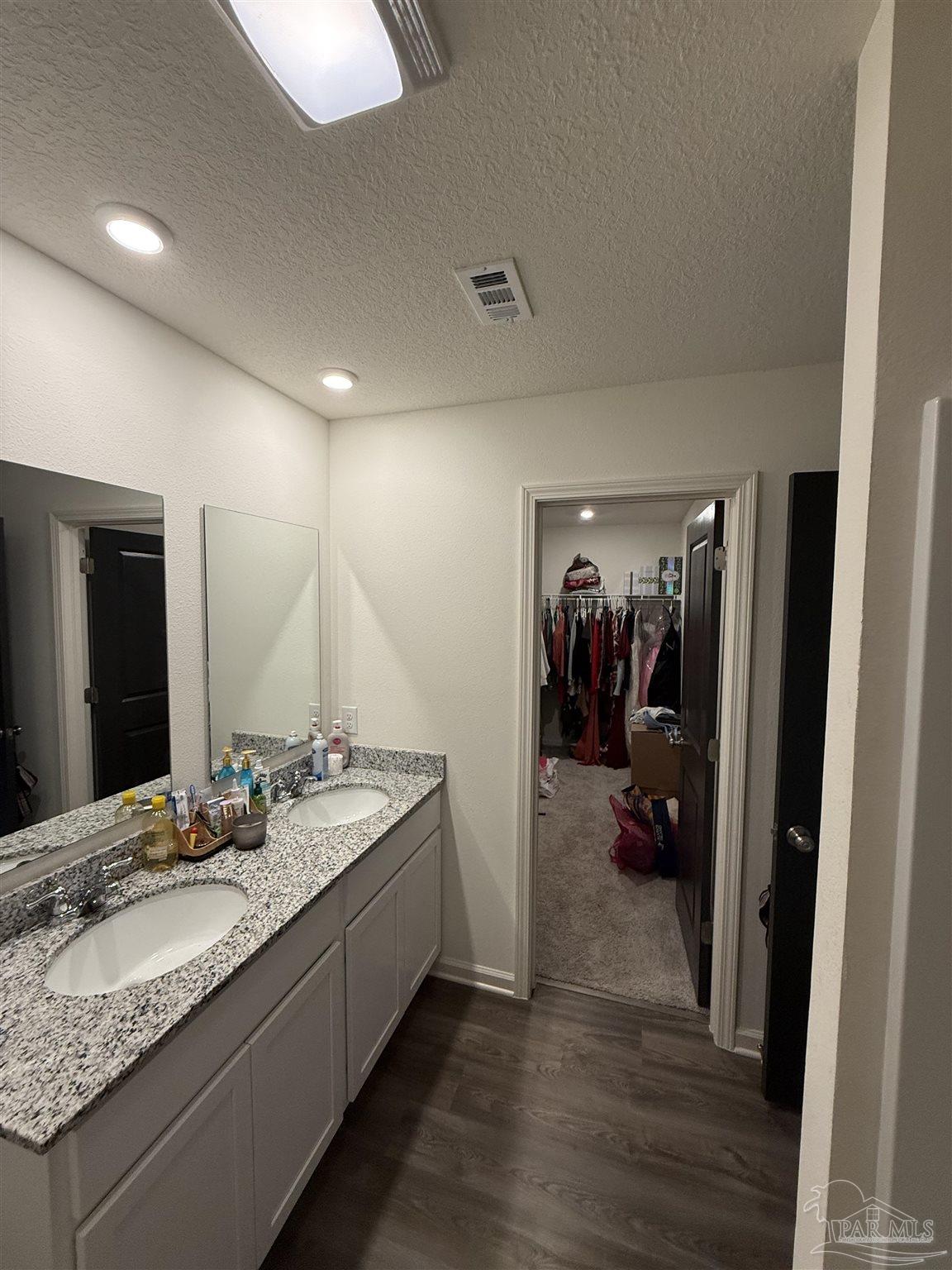 9279 3 Hollow Road Jay, FL 32565 - Photo 41 of 42 a en suite bathroom with a granite countertop sink