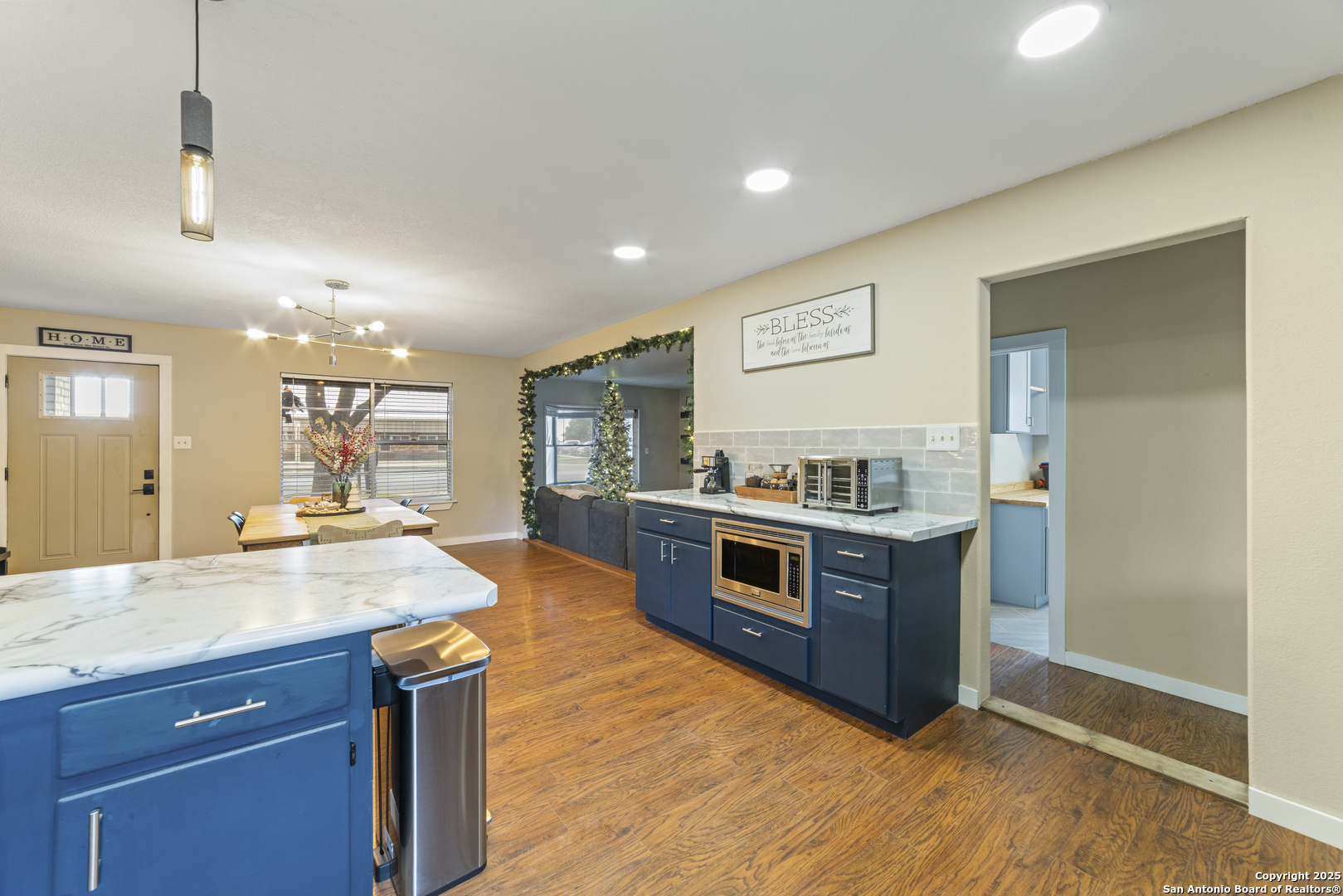 1706 24th Street Hondo, TX 78861 - Photo 16 of 40 a kitchen with stainless steel appliances granite countertop a stove and a sink