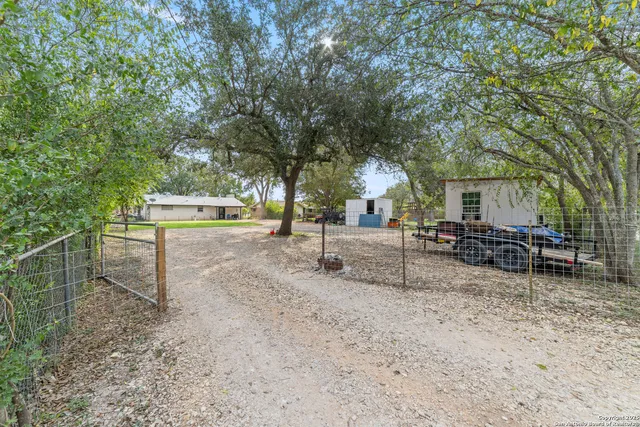 a view of backyard with trees