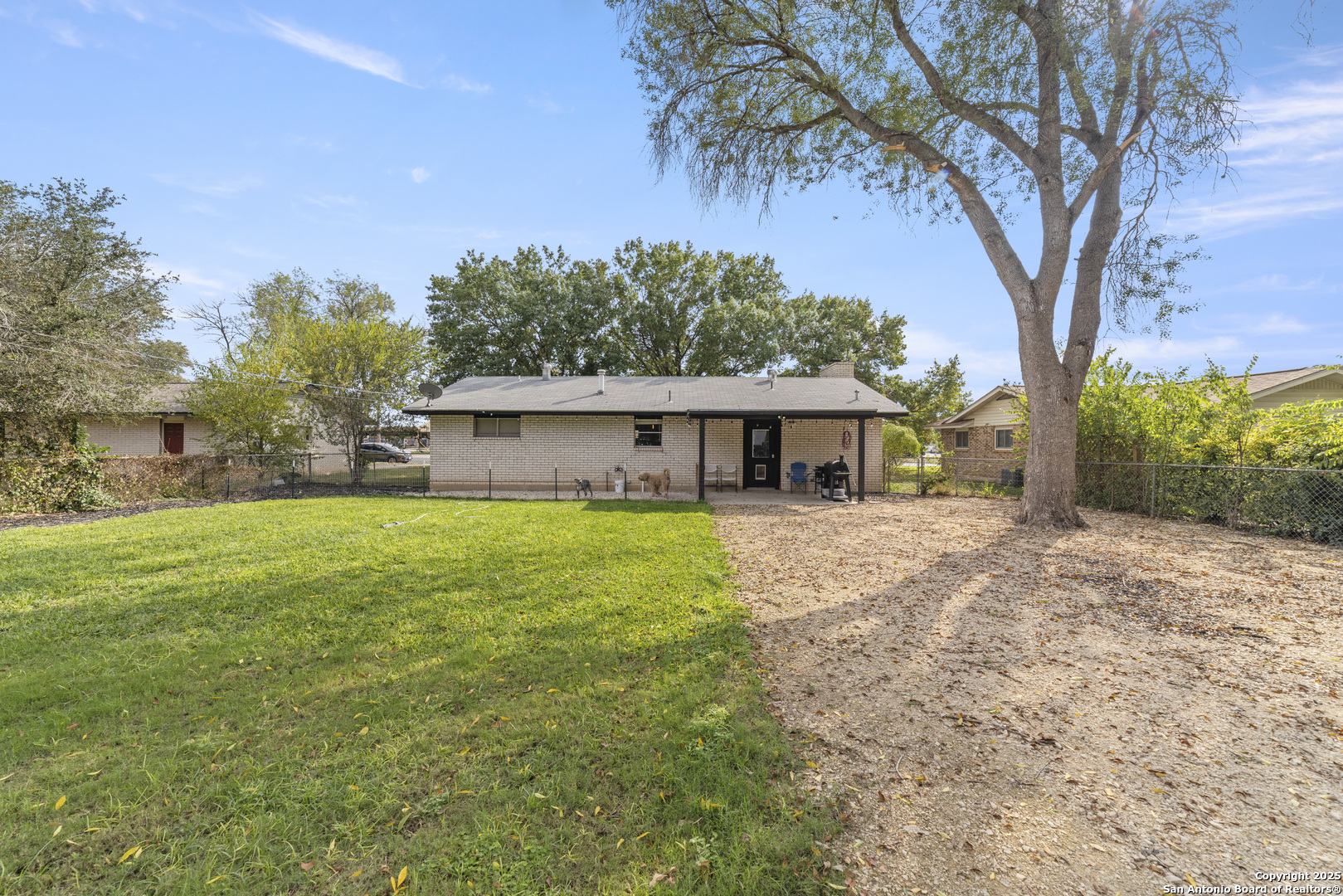 1706 24th Street Hondo, TX 78861 - Photo 30 of 40 a front view of house with yard and green space