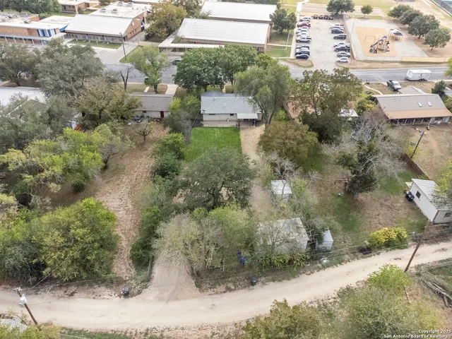 an aerial view of a residential houses