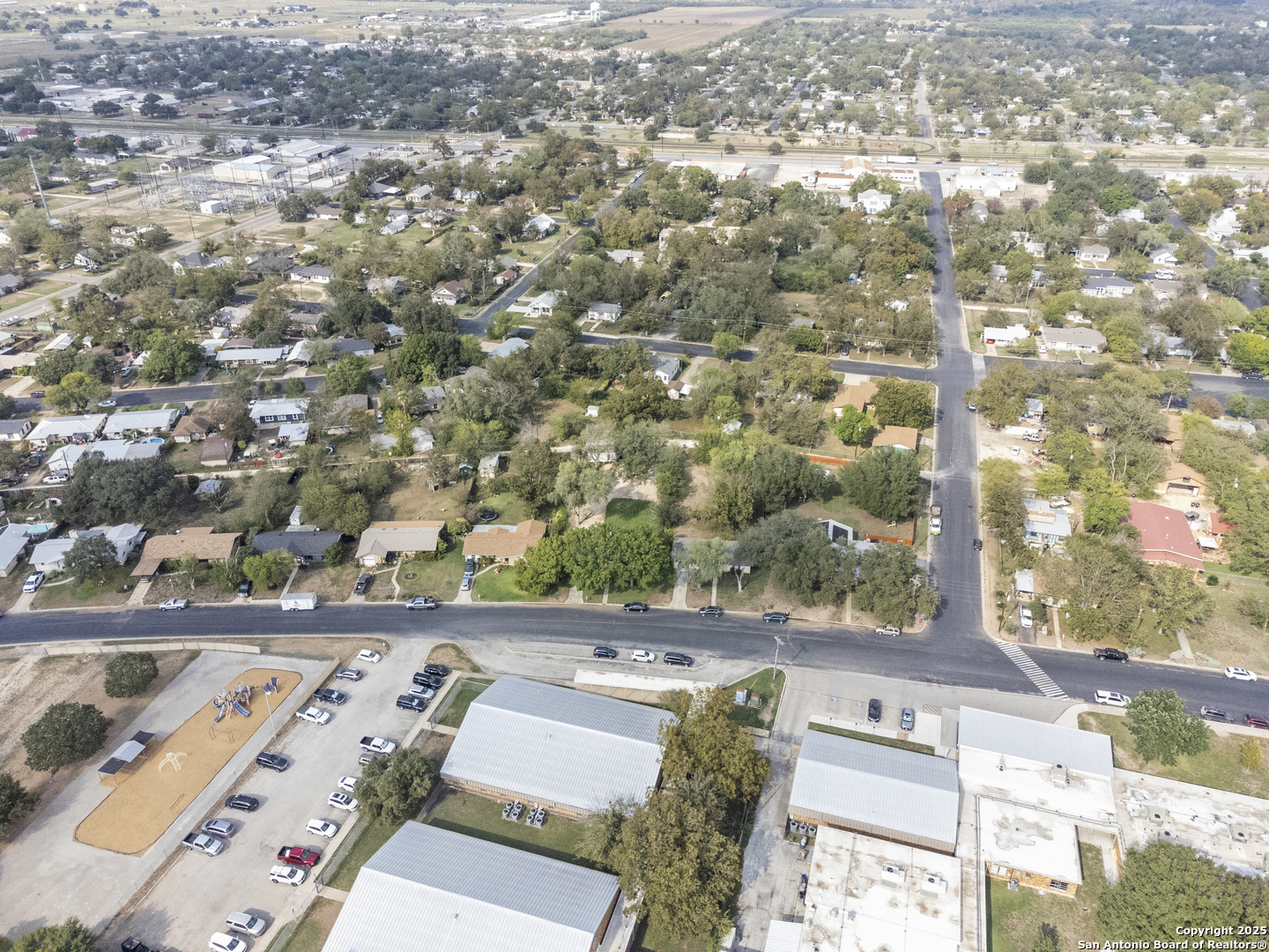 1706 24th Street Hondo, TX 78861 - Photo 39 of 40 an aerial view of a house with yard