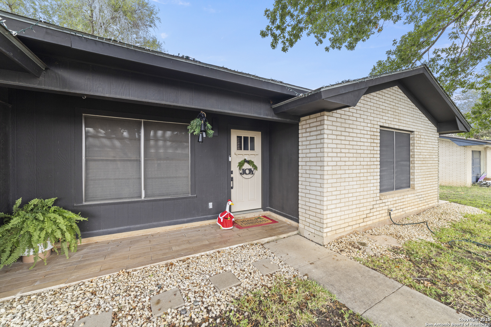 1706 24th Street Hondo, TX 78861 - Photo 5 of 40 a front view of a house with a yard