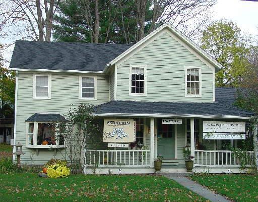 2 Titus Road Washington, CT 06794 - Photo 1 of 1 a view of a house with a yard and plants