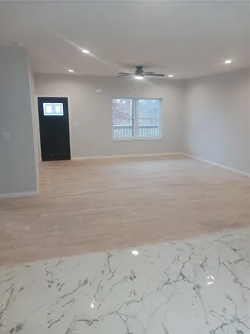 a view of kitchen with wooden floor