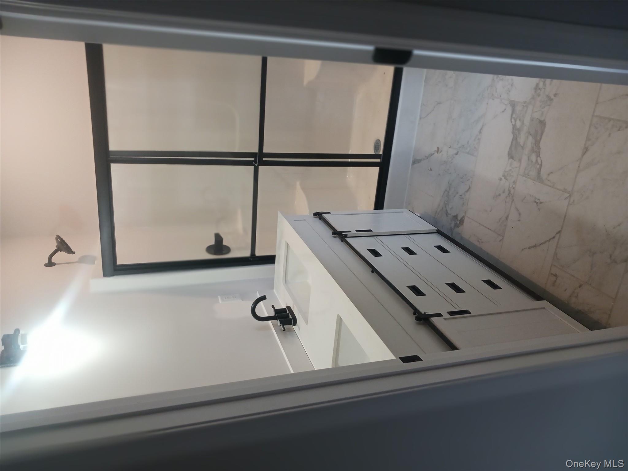 207 Roosa Gap Road Bloomingburg, NY 12721 - Photo 3 of 10 a bathroom with a sink and a mirror