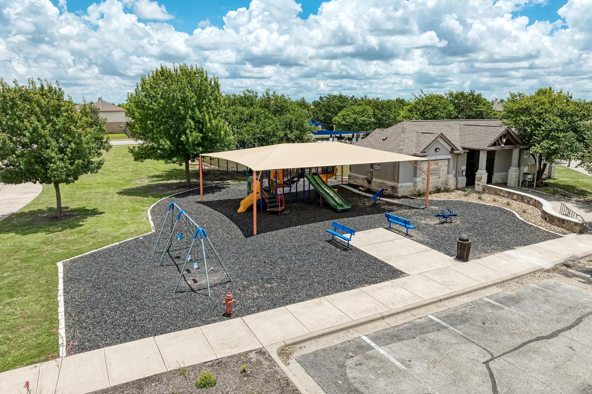 18308 Shallow Pool Drive Pflugerville, TX 78660 - Photo 35 of 40 Neighborhood COVERED playground saving you from the sun!