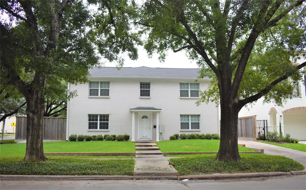 Lower left unit available for immediate move in on this perfectly located tree lined street
