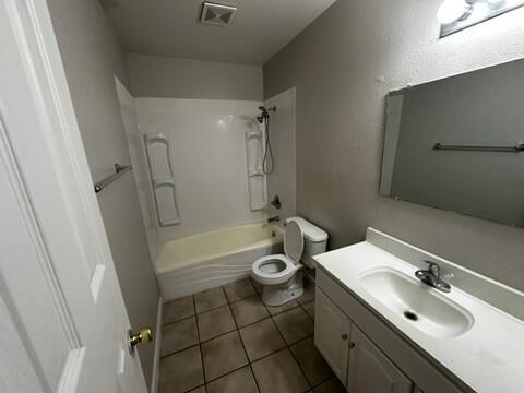 4609 Belton Avenue, Unit B Lubbock, TX 79413 - Photo 12 of 12 a bathroom with a granite countertop sink toilet and shower