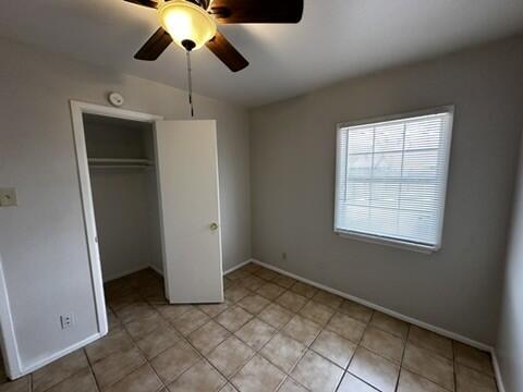 4609 Belton Avenue, Unit B Lubbock, TX 79413 - Photo 7 of 12 a view of an empty room with a window