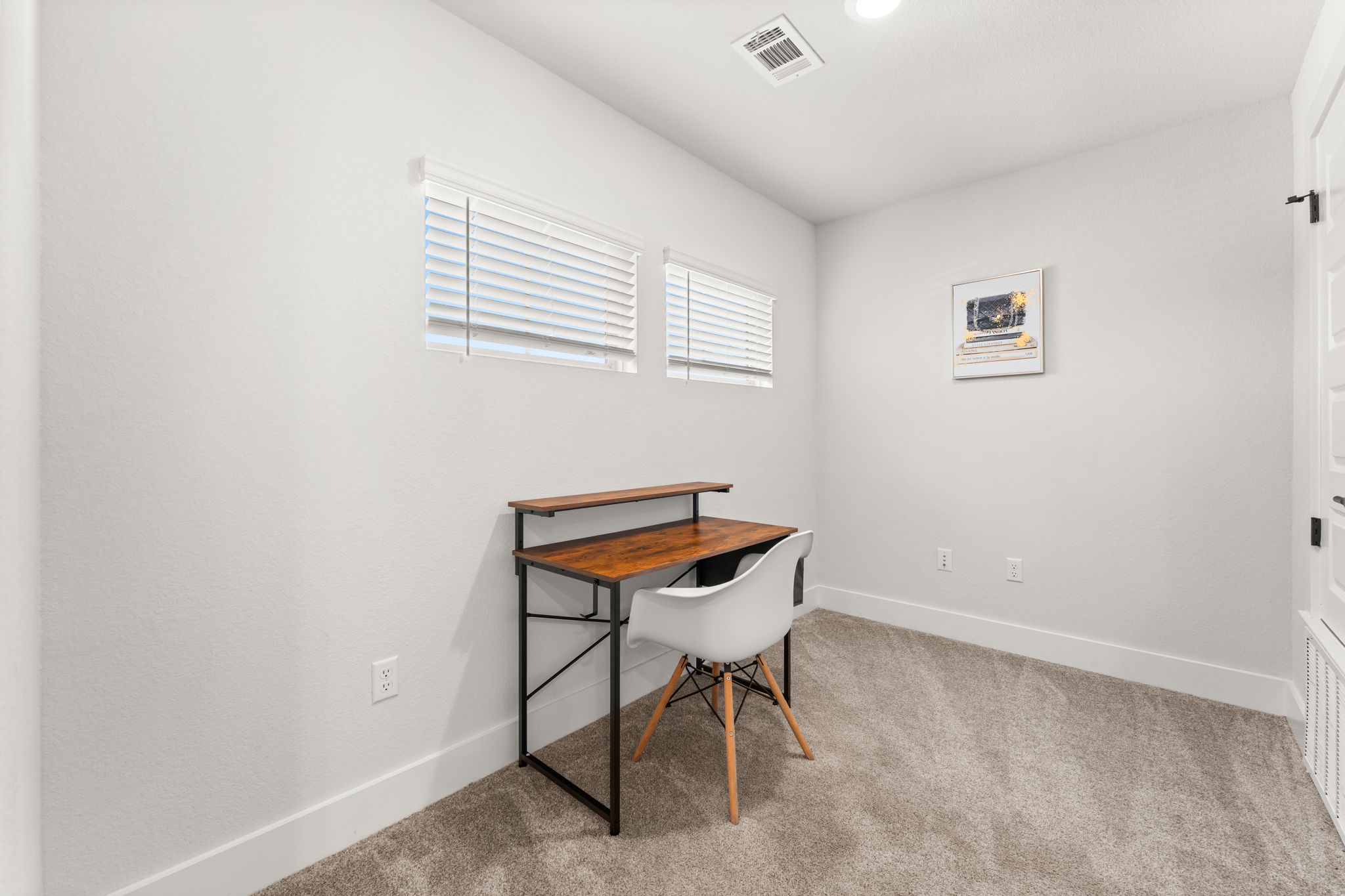 8512 McKamy Drive Austin, TX 78744 - Photo 19 of 28 The upstairs loft offers a flexible space for work, play, or relaxation.