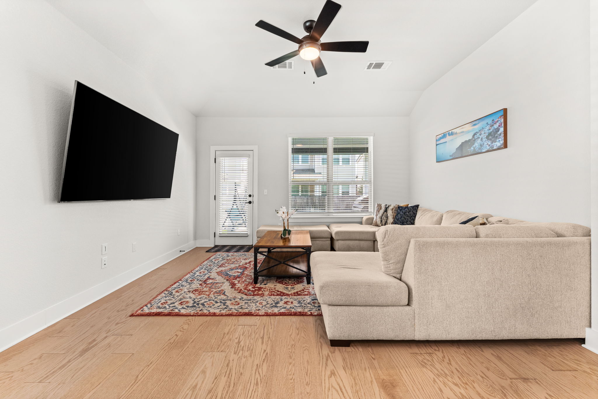 8512 McKamy Drive Austin, TX 78744 - Photo 10 of 28 The spacious living room offers an open layout perfect for entertaining.