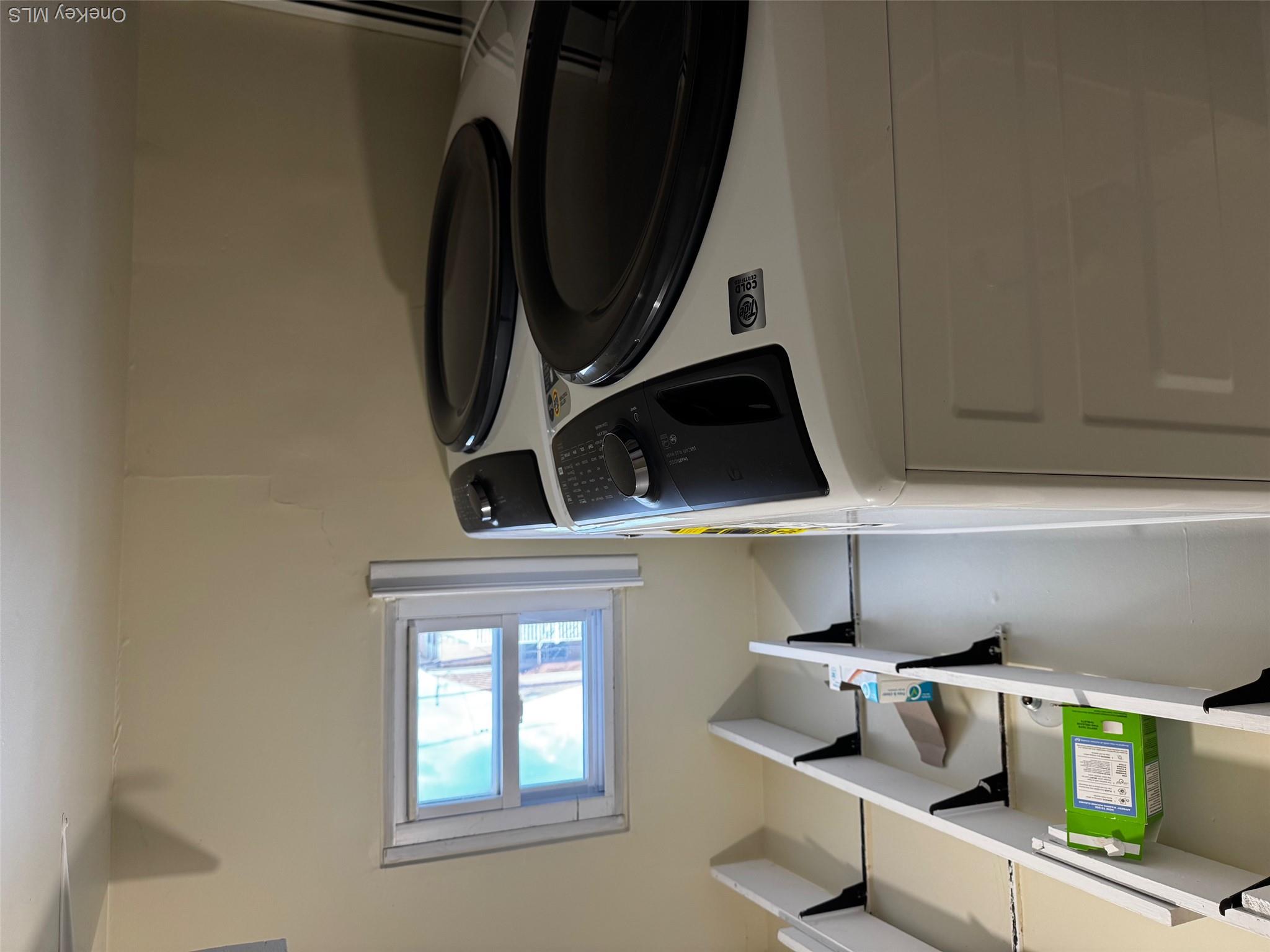 113 Maple Boulevard, Unit UPPR Long Beach, NY 11561 - Photo 10 of 11 a view of storage and utility room with washer and dryer