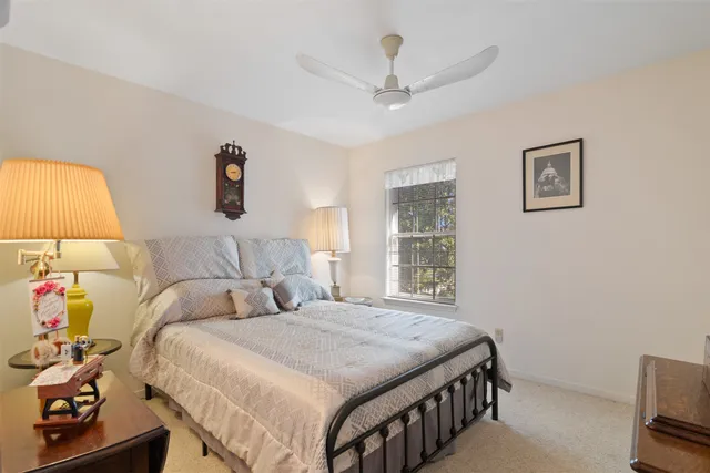 a view of a house with a yard and garden