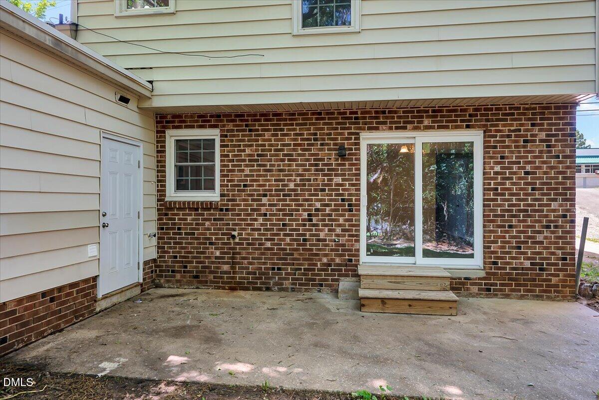 3408 Atlantic Avenue Raleigh, NC 27604 - Photo 48 of 48 a front view of a house with a window