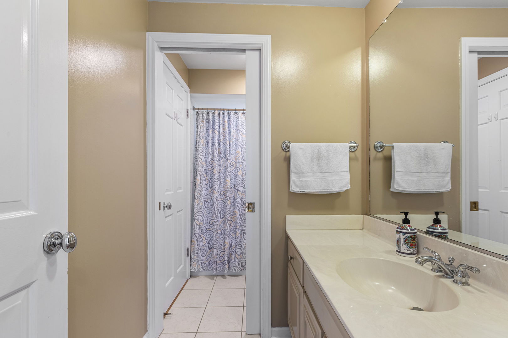 Undisclosed Address Oak Brook, IL 60523 - Photo 12 of 18 a bathroom with a sink and a mirror