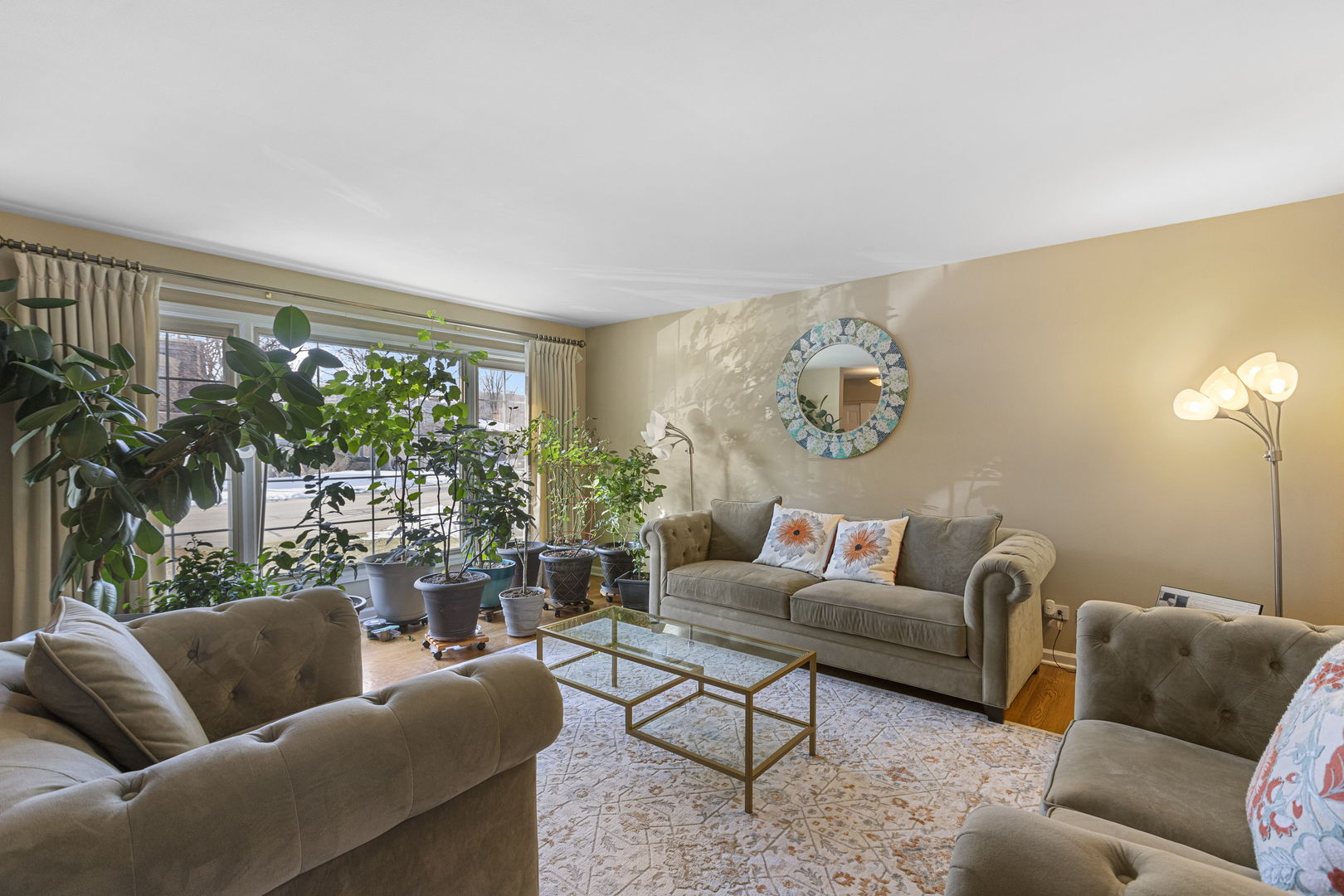 Undisclosed Address Oak Brook, IL 60523 - Photo 3 of 18 a living room with furniture and a large window