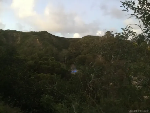 a view of mountain view with mountains in the background