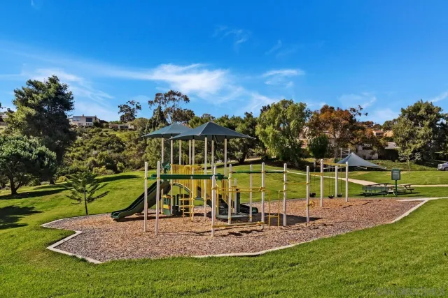 a view of a park with swings