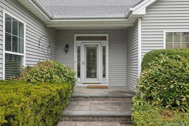 a front view of a house with a window