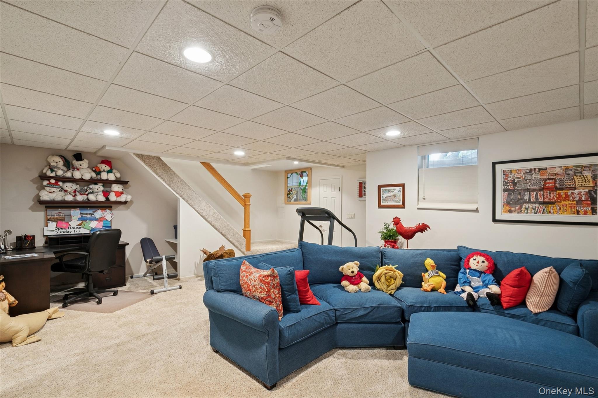 103 Rivendell Court Melville, NY 11747 - Photo 33 of 47 Living area with an office area, a drop ceiling, carpet flooring, stairs, and recessed lighting