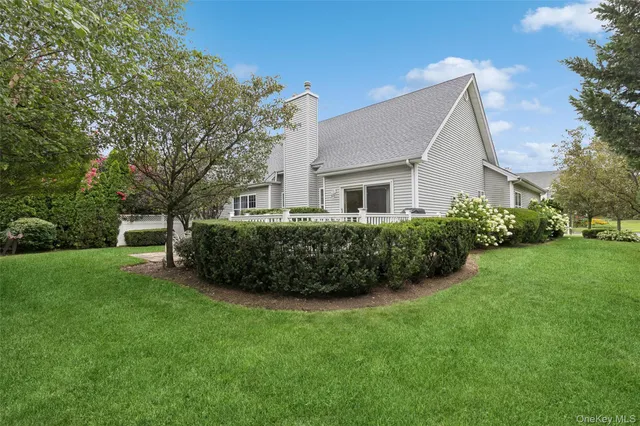 a view of a house with a garden