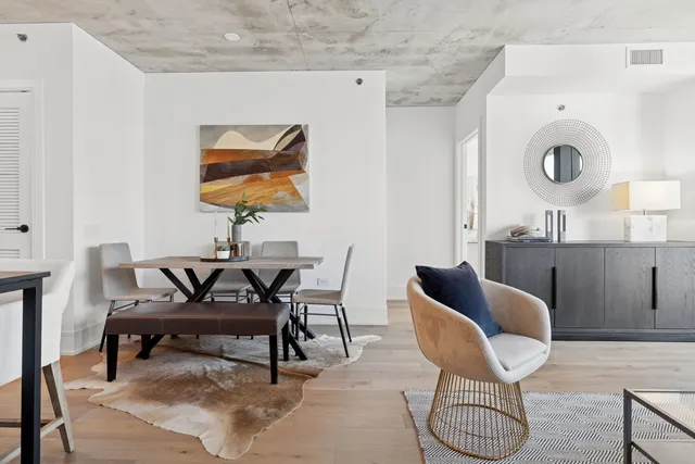 a work room with furniture and white walls