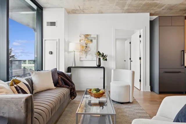 a living room with furniture and a couch