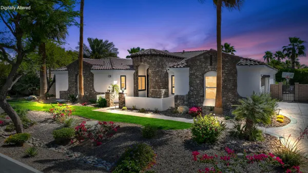 a view of a backyard with a garden and plants