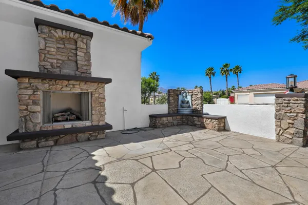 a view of a entryway with a fireplace