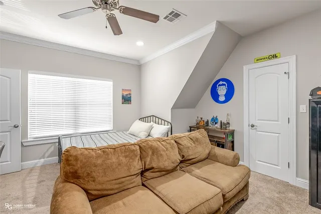 a bedroom with furniture and windows