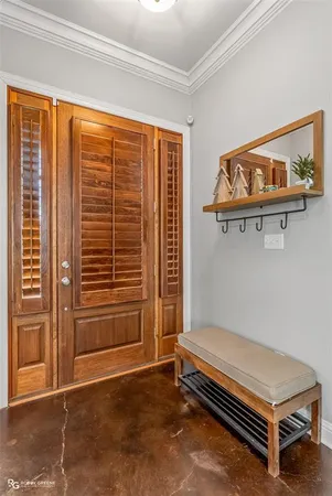 a room with furniture and a window
