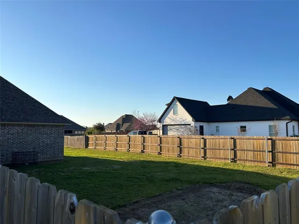 a view of house with outdoor seating space
