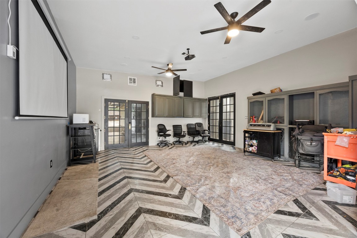 10430 Caxton Street Houston, TX 77016 - Photo 16 of 26 a view of a livingroom with a chair and a fireplace