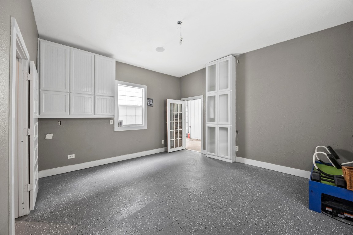 10430 Caxton Street Houston, TX 77016 - Photo 19 of 26 a view of an empty room with a window