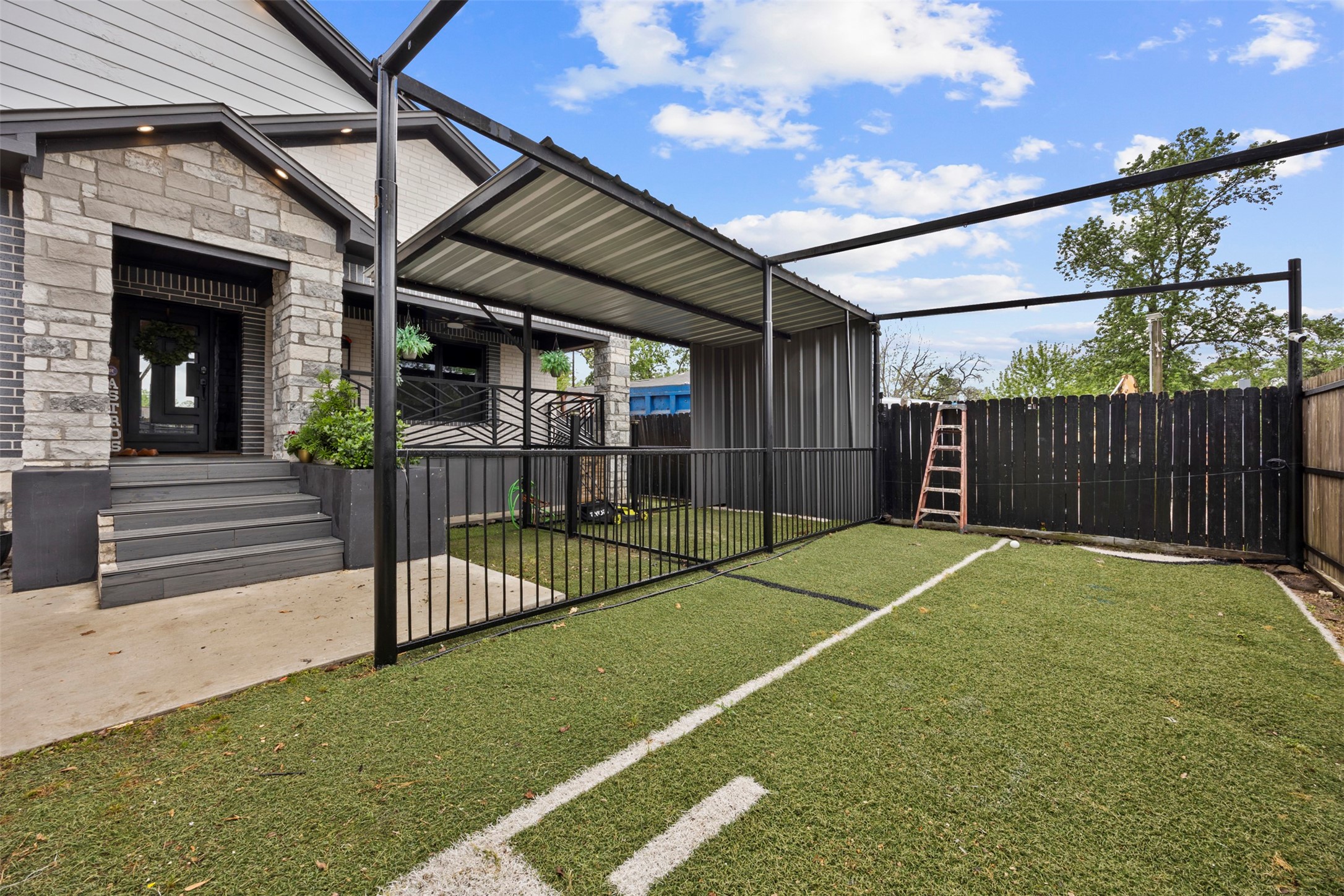 10430 Caxton Street Houston, TX 77016 - Photo 2 of 26 a view of a backyard