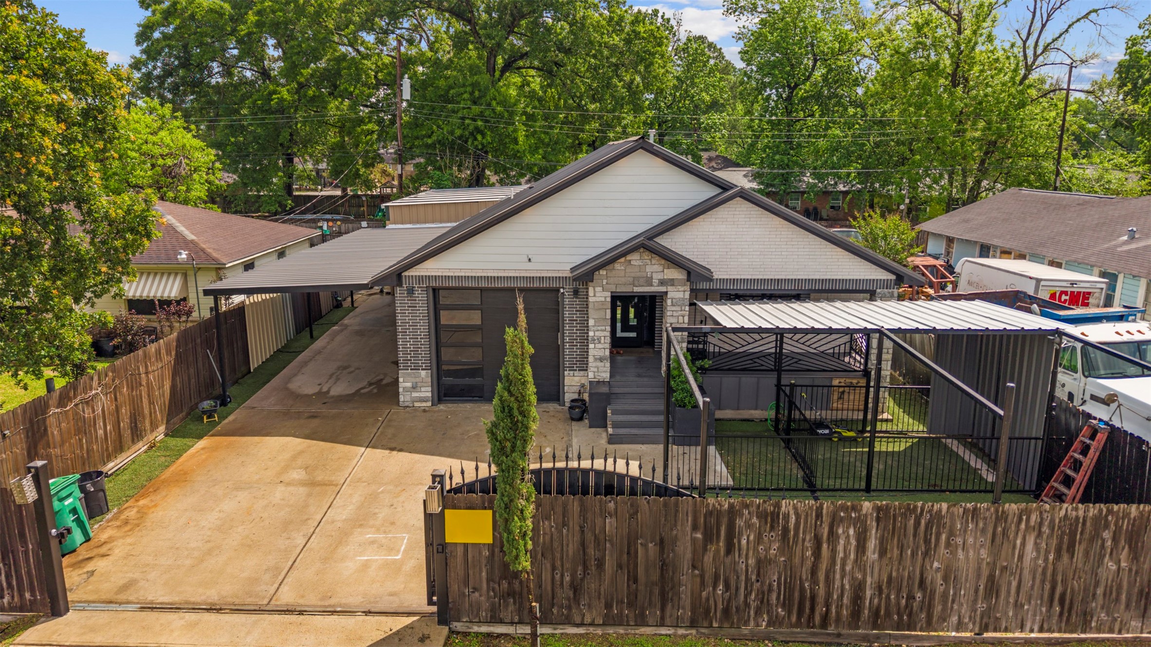 10430 Caxton Street Houston, TX 77016 - Photo 21 of 26 a house with trees in the background