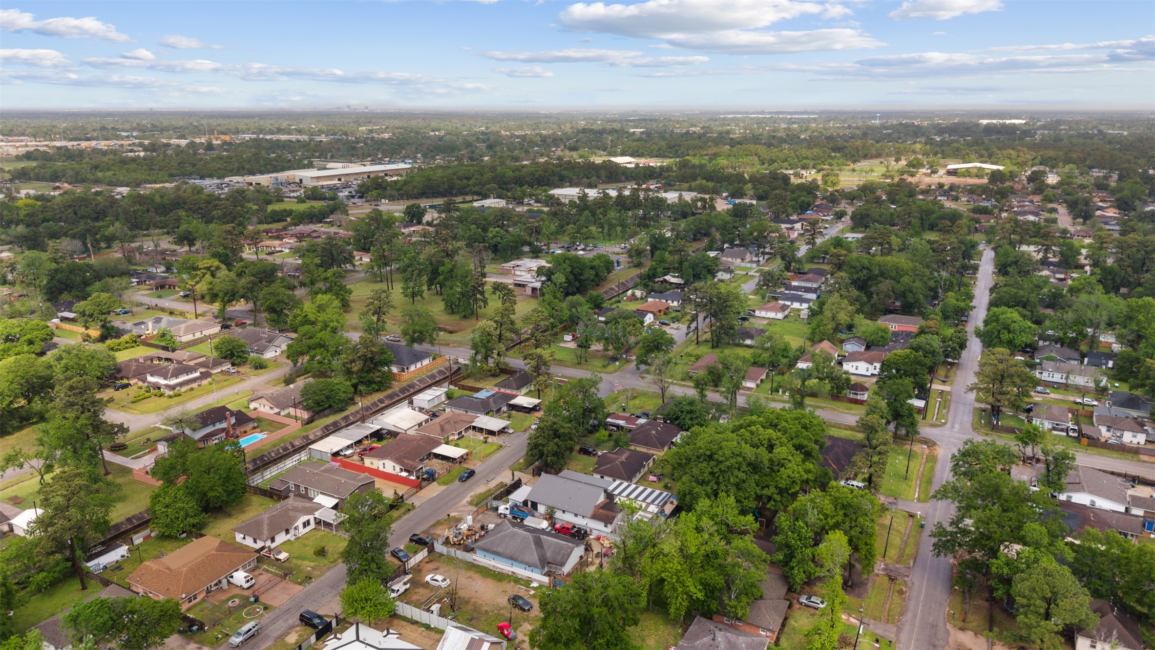 10430 Caxton Street Houston, TX 77016 - Photo 22 of 26 an aerial view of city and lake