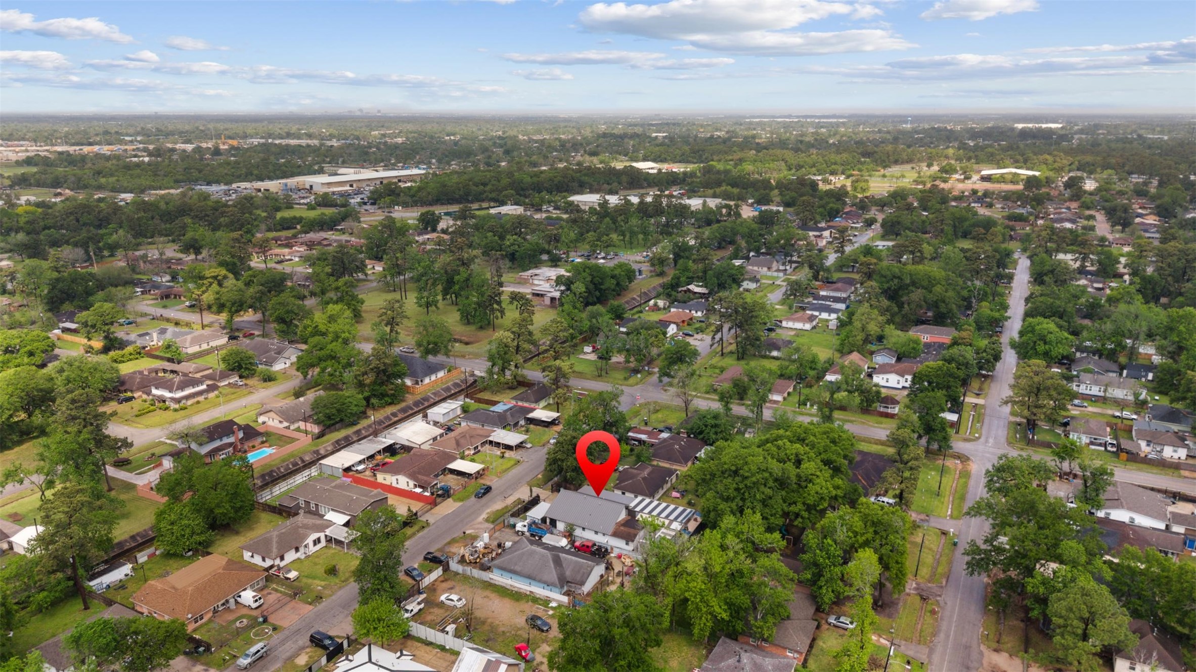 10430 Caxton Street Houston, TX 77016 - Photo 23 of 26 an aerial view of house with yard and mountain view