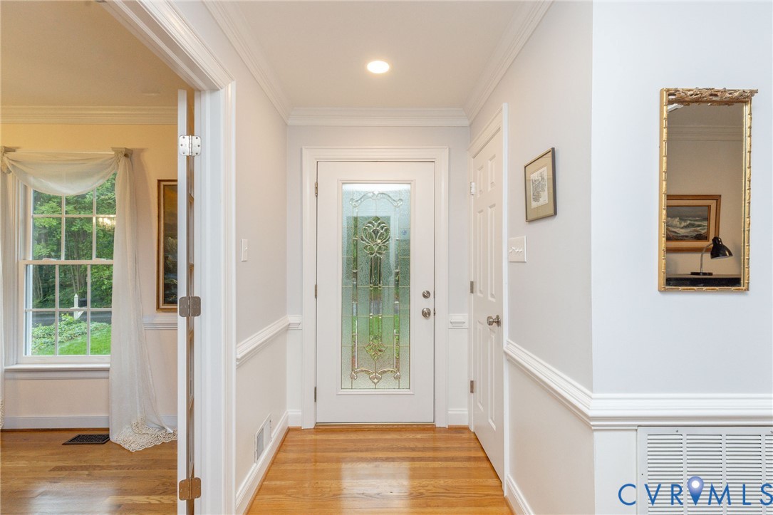 5724 Grove Forest Road Midlothian, VA 23112 - Photo 3 of 47 Entryway featuring hardwood flooring and a decorat
