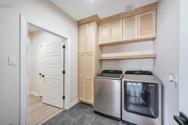 a kitchen with a stove and a refrigerator