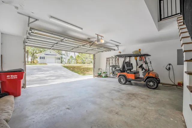 a view of parking garage with cars