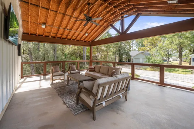 a outdoor living space with furniture and garden view