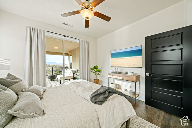 6026 Zen Trail Way St. George, UT 84790 - Photo 16 of 41 Bedroom with access to outside, dark wood-style flooring, and a ceiling fan