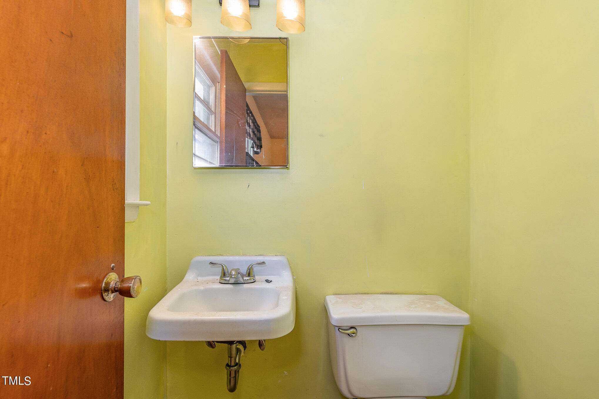 2104 Saturn Street Raleigh, NC 27603 - Photo 13 of 16 Half Bathroom