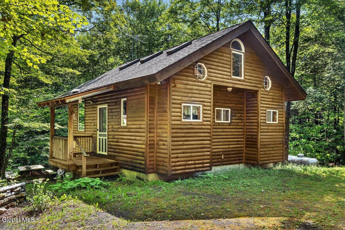 1120 Pike Brook Road Clemons, NY 12819 - Photo 1 of 43 Log Cabin