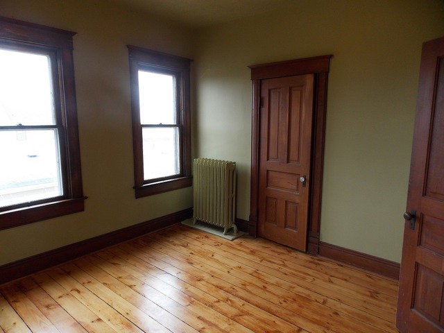 2265 North 3806th Road Serena, IL 60549 - Photo 13 of 19 a view of an empty room with wooden floor and a window