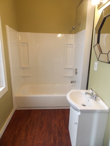 2265 North 3806th Road Serena, IL 60549 - Photo 16 of 19 a bathroom with a bathtub and a sink