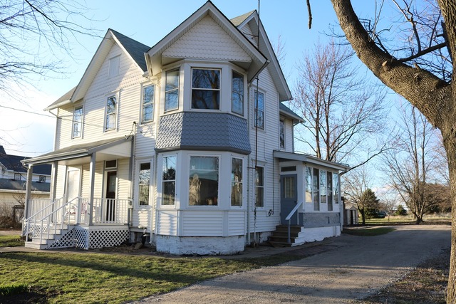 2265 North 3806th Road Serena, IL 60549 - Photo 2 of 19 a front view of a house with a yard
